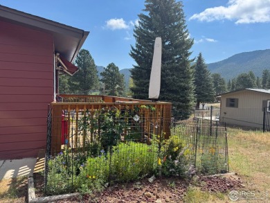 Cabin-Style Condo in Prime Estes Park Location. Enjoy the charm on Estes Park Golf Course in Colorado - for sale on GolfHomes.com, golf home, golf lot