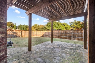 This inviting two-story home offers a practical and comfortable on The Trails of Frisco Golf Club in Texas - for sale on GolfHomes.com, golf home, golf lot