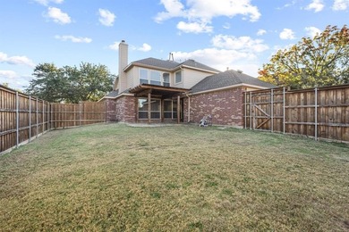 This inviting two-story home offers a practical and comfortable on The Trails of Frisco Golf Club in Texas - for sale on GolfHomes.com, golf home, golf lot