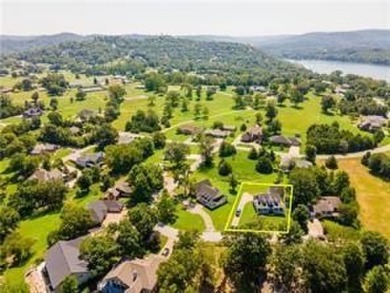 If you've been dreaming of living near the lake with a wide on Holiday Island Executive Golf Course in Arkansas - for sale on GolfHomes.com, golf home, golf lot