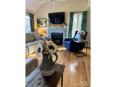 Walk to Roaring Fork Falls, the South Toe River and trails. This on Mt. Mitchell Golf Course in North Carolina - for sale on GolfHomes.com, golf home, golf lot