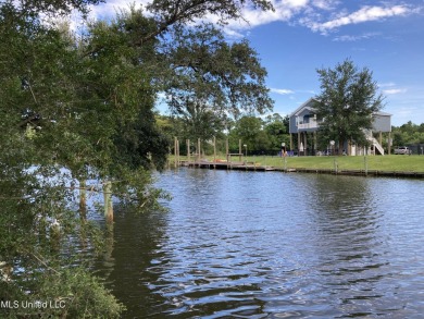 Your Gulf Coast Escape Awaits! Imagine waking up to the sound of on Pass Christian Isles Golf Club in Mississippi - for sale on GolfHomes.com, golf home, golf lot