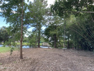 Your Gulf Coast Escape Awaits! Imagine waking up to the sound of on Pass Christian Isles Golf Club in Mississippi - for sale on GolfHomes.com, golf home, golf lot