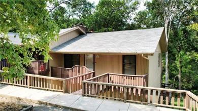 Discover the charm of Bella Vista living in this inviting on Bella Vista Country Club and Golf Course in Arkansas - for sale on GolfHomes.com, golf home, golf lot