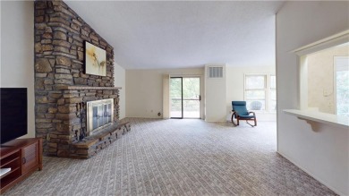 Discover the charm of Bella Vista living in this inviting on Bella Vista Country Club and Golf Course in Arkansas - for sale on GolfHomes.com, golf home, golf lot