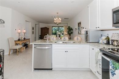 Enjoy expansive, tranquil water and golf course views that you on Panther Run Golf Club in Florida - for sale on GolfHomes.com, golf home, golf lot