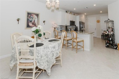 Enjoy expansive, tranquil water and golf course views that you on Panther Run Golf Club in Florida - for sale on GolfHomes.com, golf home, golf lot