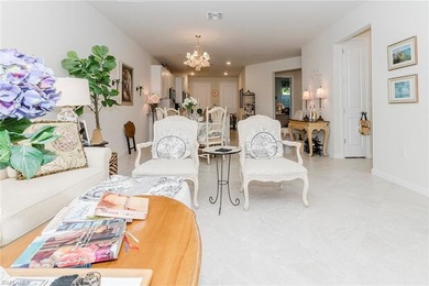 Enjoy expansive, tranquil water and golf course views that you on Panther Run Golf Club in Florida - for sale on GolfHomes.com, golf home, golf lot