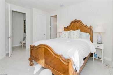 Enjoy expansive, tranquil water and golf course views that you on Panther Run Golf Club in Florida - for sale on GolfHomes.com, golf home, golf lot