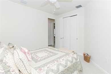 Enjoy expansive, tranquil water and golf course views that you on Panther Run Golf Club in Florida - for sale on GolfHomes.com, golf home, golf lot