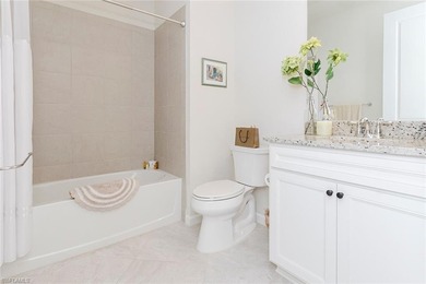 Enjoy expansive, tranquil water and golf course views that you on Panther Run Golf Club in Florida - for sale on GolfHomes.com, golf home, golf lot