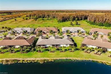 Enjoy expansive, tranquil water and golf course views that you on Panther Run Golf Club in Florida - for sale on GolfHomes.com, golf home, golf lot