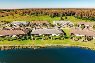 Enjoy expansive, tranquil water and golf course views that you on Panther Run Golf Club in Florida - for sale on GolfHomes.com, golf home, golf lot