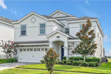 MUST SEE THIS FULLY DISNEY-THEMED POOL HOME WITH LAKE VIEW IN on The Oasis Club at Champions Gate in Florida - for sale on GolfHomes.com, golf home, golf lot