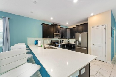 MUST SEE THIS FULLY DISNEY-THEMED POOL HOME WITH LAKE VIEW IN on The Oasis Club at Champions Gate in Florida - for sale on GolfHomes.com, golf home, golf lot
