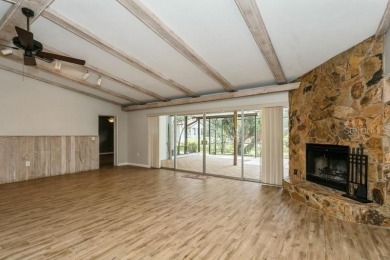 Tucked inside a charming Cul de sac, this 3 bedroom, 2 bath plus on The Dunedin Country Club in Florida - for sale on GolfHomes.com, golf home, golf lot