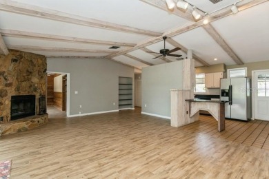 Tucked inside a charming Cul de sac, this 3 bedroom, 2 bath plus on The Dunedin Country Club in Florida - for sale on GolfHomes.com, golf home, golf lot