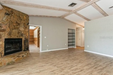 Tucked inside a charming Cul de sac, this 3 bedroom, 2 bath plus on The Dunedin Country Club in Florida - for sale on GolfHomes.com, golf home, golf lot