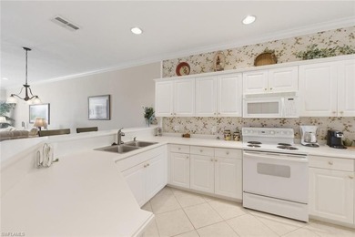 One or more photo(s) has been virtually staged, AI generated or on Naples Lakes Country Club in Florida - for sale on GolfHomes.com, golf home, golf lot