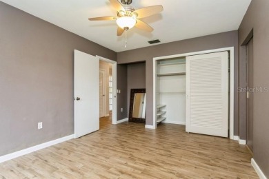 Tucked inside a charming Cul de sac, this 3 bedroom, 2 bath plus on The Dunedin Country Club in Florida - for sale on GolfHomes.com, golf home, golf lot