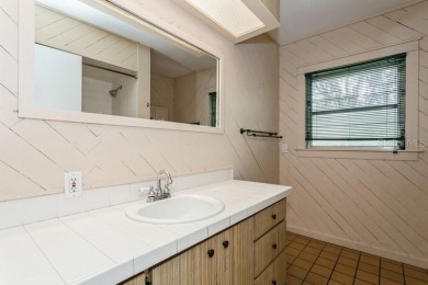 Tucked inside a charming Cul de sac, this 3 bedroom, 2 bath plus on The Dunedin Country Club in Florida - for sale on GolfHomes.com, golf home, golf lot