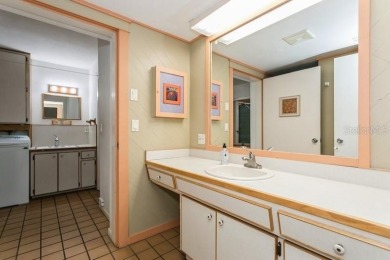 Tucked inside a charming Cul de sac, this 3 bedroom, 2 bath plus on The Dunedin Country Club in Florida - for sale on GolfHomes.com, golf home, golf lot