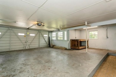 Tucked inside a charming Cul de sac, this 3 bedroom, 2 bath plus on The Dunedin Country Club in Florida - for sale on GolfHomes.com, golf home, golf lot
