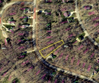 Lovely wooded lot located close to the indoor pool and marina on Apple Valley Golf Course in Ohio - for sale on GolfHomes.com, golf home, golf lot