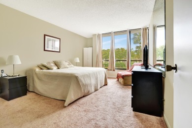 Updated 2/2 in the premiere country Club community of Boca West on Boca West Golf and Country Club in Florida - for sale on GolfHomes.com, golf home, golf lot