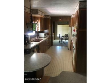 Fully furnished home in desirable area of the community with on Tucson Estates Golf Course in Arizona - for sale on GolfHomes.com, golf home, golf lot