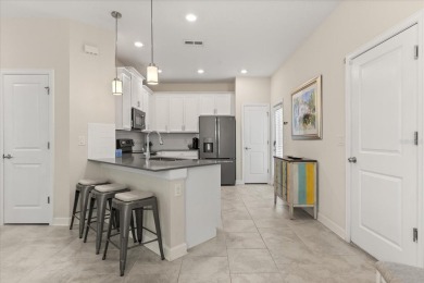 Welcome to this exceptional 5 bedroom, 3 bathroom residence on ChampionsGate Golf Resort in Florida - for sale on GolfHomes.com, golf home, golf lot