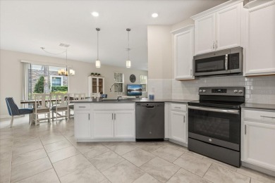Welcome to this exceptional 5 bedroom, 3 bathroom residence on ChampionsGate Golf Resort in Florida - for sale on GolfHomes.com, golf home, golf lot