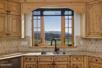 Enjoy breathtaking views from the expansive deck and patio of on Club At Cordillera Summit Course in Colorado - for sale on GolfHomes.com, golf home, golf lot