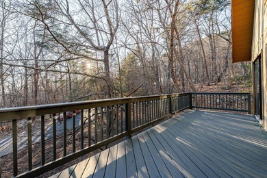 Escape to comfort and nature in this inviting 2BR/2BA bungalow on Woodstone Meadows Golf Course At Massanutten in Virginia - for sale on GolfHomes.com, golf home, golf lot