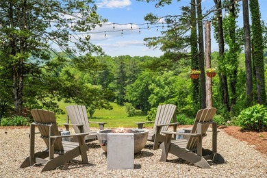 Between two mountain ridges lies a broad grassy meadow where on Headwaters Golf Club in North Carolina - for sale on GolfHomes.com, golf home, golf lot