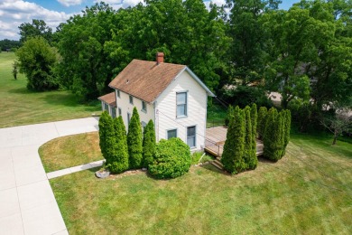This two bedroom one and a half bath charming farm house built on Grosse Ile Golf and Country Club in Michigan - for sale on GolfHomes.com, golf home, golf lot