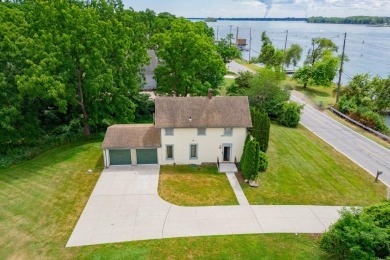 This two bedroom one and a half bath charming farm house built on Grosse Ile Golf and Country Club in Michigan - for sale on GolfHomes.com, golf home, golf lot