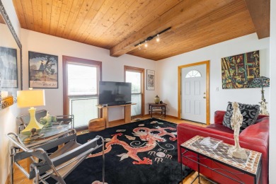 This two bedroom one and a half bath charming farm house built on Grosse Ile Golf and Country Club in Michigan - for sale on GolfHomes.com, golf home, golf lot
