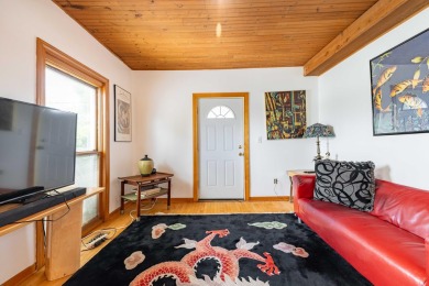 This two bedroom one and a half bath charming farm house built on Grosse Ile Golf and Country Club in Michigan - for sale on GolfHomes.com, golf home, golf lot