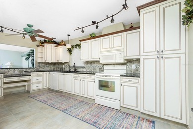 Experience the relaxed Florida lifestyle in this spacious on Kingsway Country Club in Florida - for sale on GolfHomes.com, golf home, golf lot