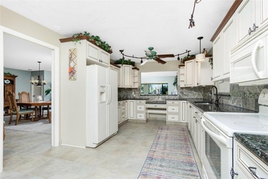 Experience the relaxed Florida lifestyle in this spacious on Kingsway Country Club in Florida - for sale on GolfHomes.com, golf home, golf lot