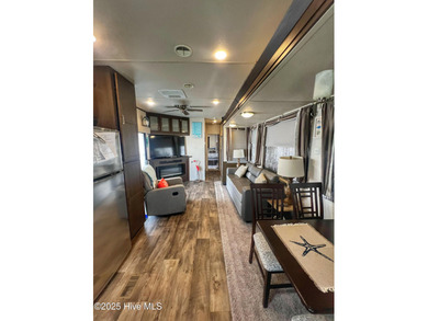 Adorable, newer camper with fabulous attached covered porch. 1 on North Shore Country Club in North Carolina - for sale on GolfHomes.com, golf home, golf lot