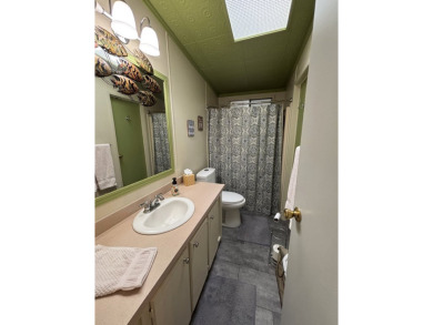 This home is located within a 55 + resort style leased land on Big Cypress Golf and Country Club in Florida - for sale on GolfHomes.com, golf home, golf lot