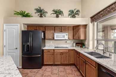 Golf course views, gated active-adult living, and seller-owned on Arizona Traditions Golf Club in Arizona - for sale on GolfHomes.com, golf home, golf lot