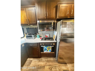 Adorable, newer camper with fabulous attached covered porch. 1 on North Shore Country Club in North Carolina - for sale on GolfHomes.com, golf home, golf lot