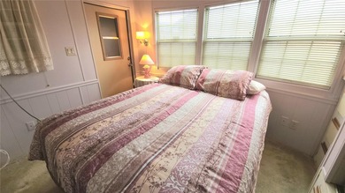 TWO BEDROOM, 1 1/2 BATHROOM MOBILE HOME IN ACTIVE 55+ COMMUNITY on River Run Golf Links in Florida - for sale on GolfHomes.com, golf home, golf lot