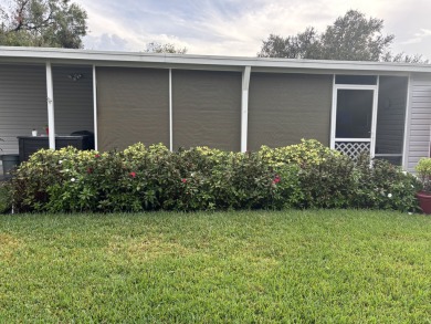 This home is located within a 55 + resort style leased land on Big Cypress Golf and Country Club in Florida - for sale on GolfHomes.com, golf home, golf lot