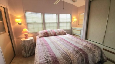 TWO BEDROOM, 1 1/2 BATHROOM MOBILE HOME IN ACTIVE 55+ COMMUNITY on River Run Golf Links in Florida - for sale on GolfHomes.com, golf home, golf lot