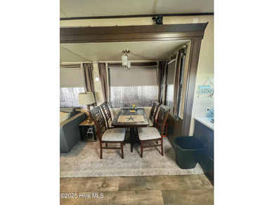 Adorable, newer camper with fabulous attached covered porch. 1 on North Shore Country Club in North Carolina - for sale on GolfHomes.com, golf home, golf lot