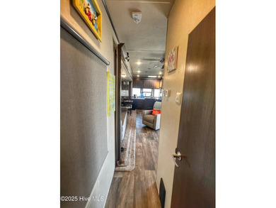 Adorable, newer camper with fabulous attached covered porch. 1 on North Shore Country Club in North Carolina - for sale on GolfHomes.com, golf home, golf lot